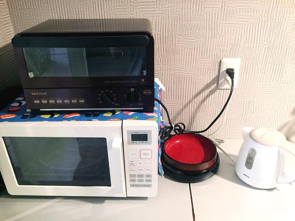 Tokyo Mika House Hotel Bagian luar foto